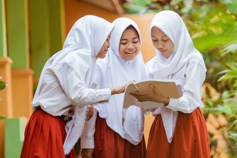 Ilustrasi siswa SD. Jadwal SPMB 2025 SD-SMA(Shutterstock/Odua Image)