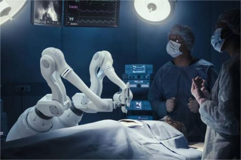 dokter mengoperasikan robot bedah canggih di ruang operasi modern