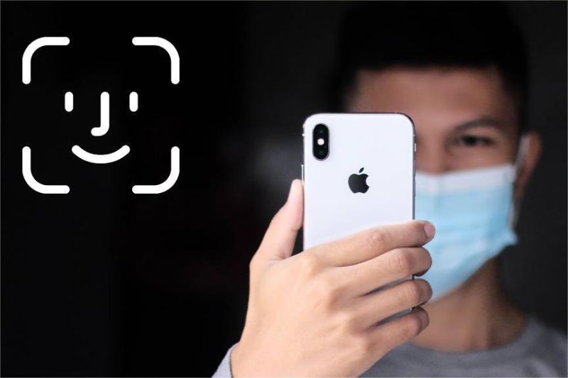 ilustrasi pengguna membuka smartphone dengan face unlock 3D saat memakai masker
