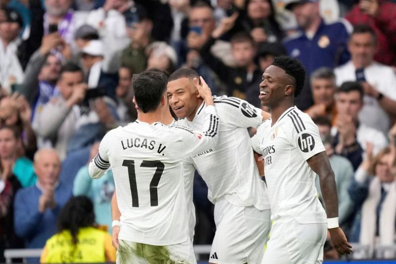 Selebrasi Kylian Mbappe dalam laga La Liga antara Real Madrid vs Celta Vigo, Minggu (4/5/2025). (c) AP Photo/Jose Breton