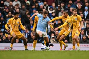 Aksi pemain Manchester City dalam laga melawan Brighton di Premier League