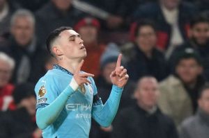 Selebrasi Phil Foden dalam laga Premier League antara Brentford vs Manchester City, Rabu (15/1/2025). (c) AP Photo/Alastair Grant