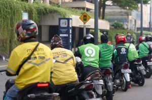 Wacana pengemudi ojol jadi pekerja tetap ditolak aplikator.(((SHUTTERSTOCK/CREATIVA IMAGES)))