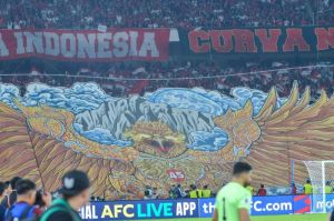 Koreo yang ditampilkan suporter Timnas Indonesia pada pertandingan melawan Bahrain dalam laga lanjutan ronde ketiga Kualifikasi Piala Dunia 2026 Zona Asia, Selasa (25/3/2025)