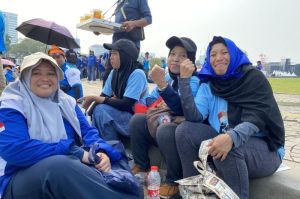 Anggota serikat buruh perusahaan RTTM di peringatan Hari Buruh Internasional di Monas, Jakarta Pusat pada Kamis (1/4/2025).(Hanifah Salsabila)