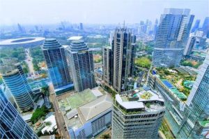 gedung perkantoran di kawasan bisnis dengan aktivitas investasi
