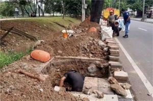 jalan beton dan gedung tinggi tanpa sumur resapan