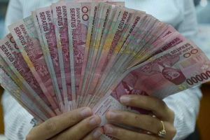 Israel Serang Balik Iran, Kurs Rupiah Diprediksi Makin Melemah